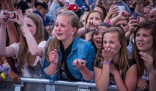 female teen fans are crazy about one direction