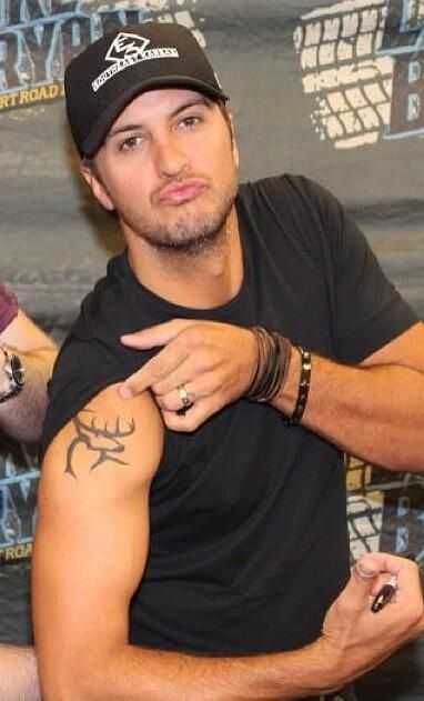 Luke Bryan has tattooed his wifes initial in his forearm