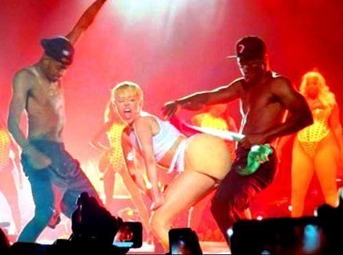 Fake booty Miley Cyrus twerking on Mexican flag