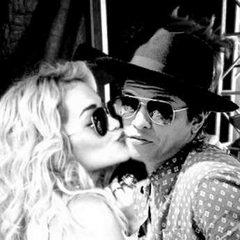 Bruno Mars kissing Rita Ora