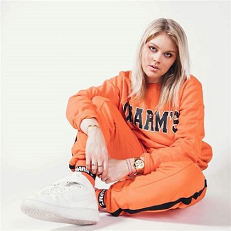 Lucy Whittaker, the English lesbian singer with a cool attitude.